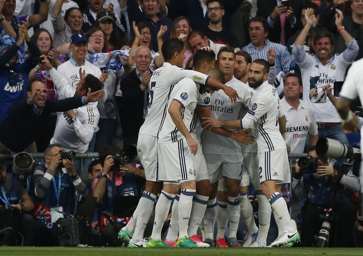 Real Madrid's Cristiano Ronaldo celebrates scoring their first goal with team mates
