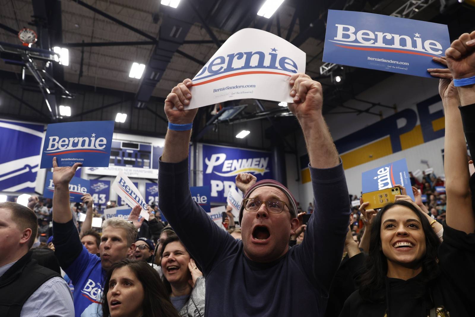 Supporters cheer as Democratic U.S. presidential candidate Senator Bernie Sanders arrives at his New Hampshire primary night rally in Manchester, N.H., U.S.