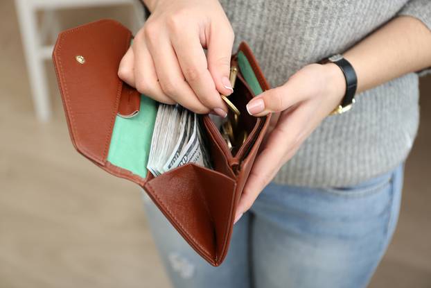 Girl,With,Brown,Wallet,Full,Of,Money