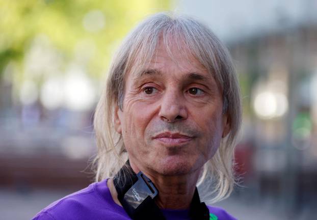 French Spiderman Alain Robert is seen before climbing a skyscraper in La Defense near Paris