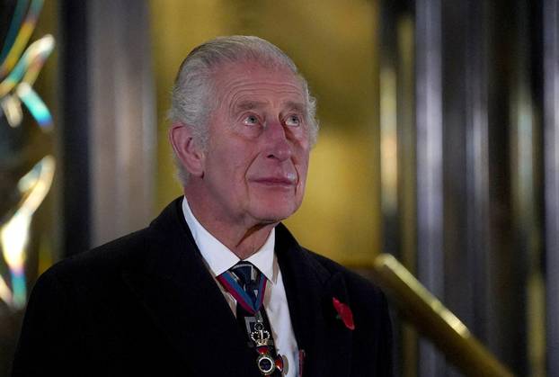 Britain's King Charles and Queen Camilla attend the Royal British Legion Festival of Remembrance, in London