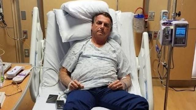 Brazil's former President Jair Bolsonaro on a hospital bed at an unspecified location