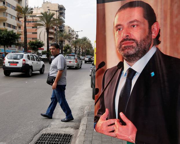 A poster depicting Saad al-Hariri, who has resigned as Lebanon