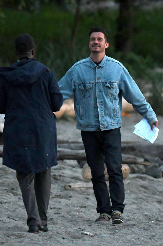EXCLUSIVE: Orlando Bloom sports a goatee, filming new project with Freida Pinto in Vancouver, Canada