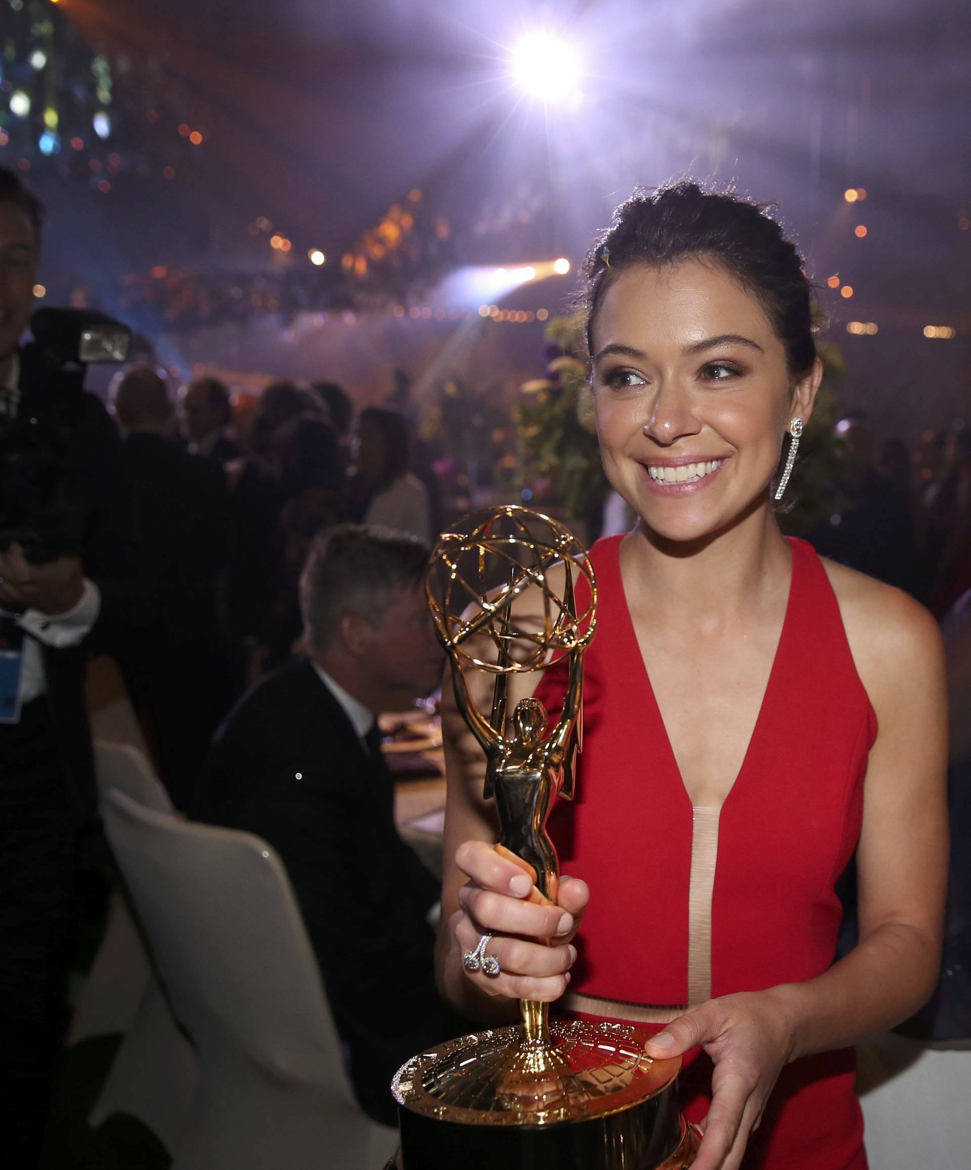Actress Tatiana Maslany holds her award for Outstanding Lead Actress In A Drama Series as she mingles at the Governors Ball after the 68th Primetime Emmy Awards in Los Angeles