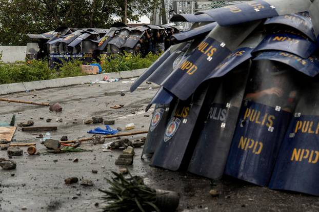 Filipinos protest to denounce what they say is corruption linked to flood control projects, in Manila