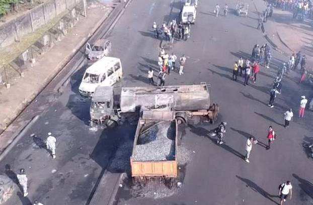 Burnt collided trucks are pictured after a fuel tanker explosion in Freetown