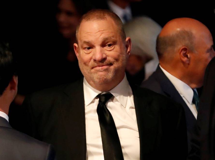 FILE PHOTO: Producer Weinstein stands in the audience ahead of the first presidential debate between U.S. presidential nominee Donald trump and U.S. presidential nominee Clinton in Hempstead