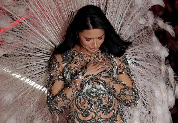 Model Adriana Lima presents a creation during the 2018 Victoria