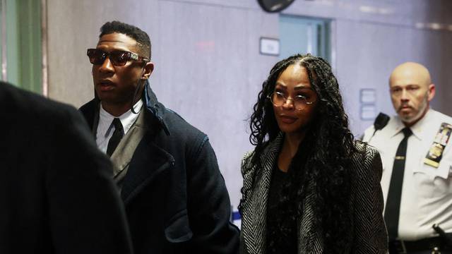 Actor Jonathan Majors arrives with Meagan Good for the jury selection in his  assault and harassment case at Manhattan Criminal Court in New York City