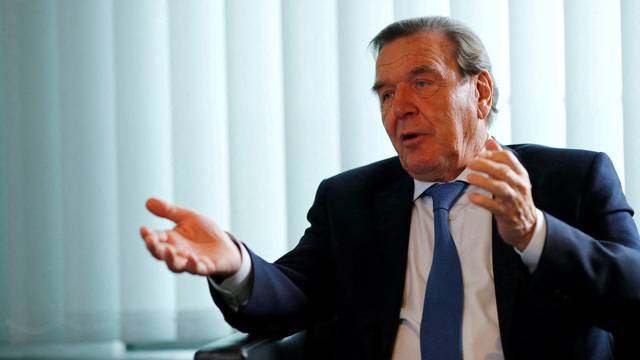 FILE PHOTO: Former German Chancellor Gerhard Schroeder is pictured during an interview with Reuters in his office in Berlin
