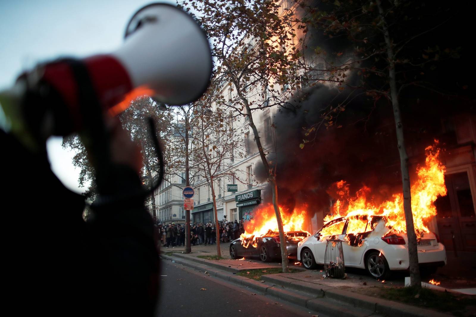 Protests over proposed curbs on identifying police, in Paris