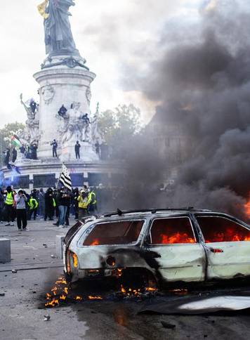 Police clash with protesters during demonstration in Paris