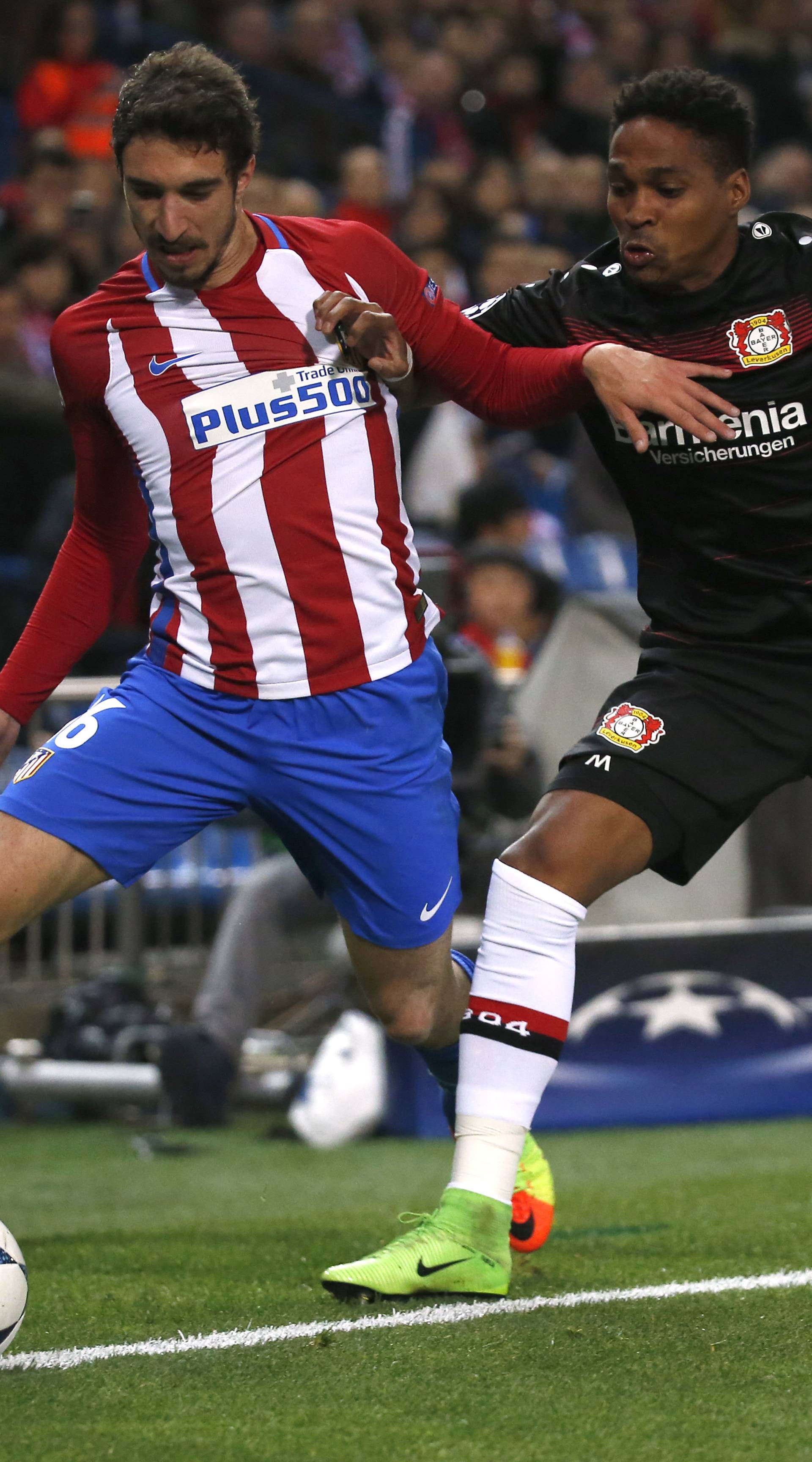 Atletico Madrid's Sime Vrsaljko in action with Bayer Leverkusen's Wendell
