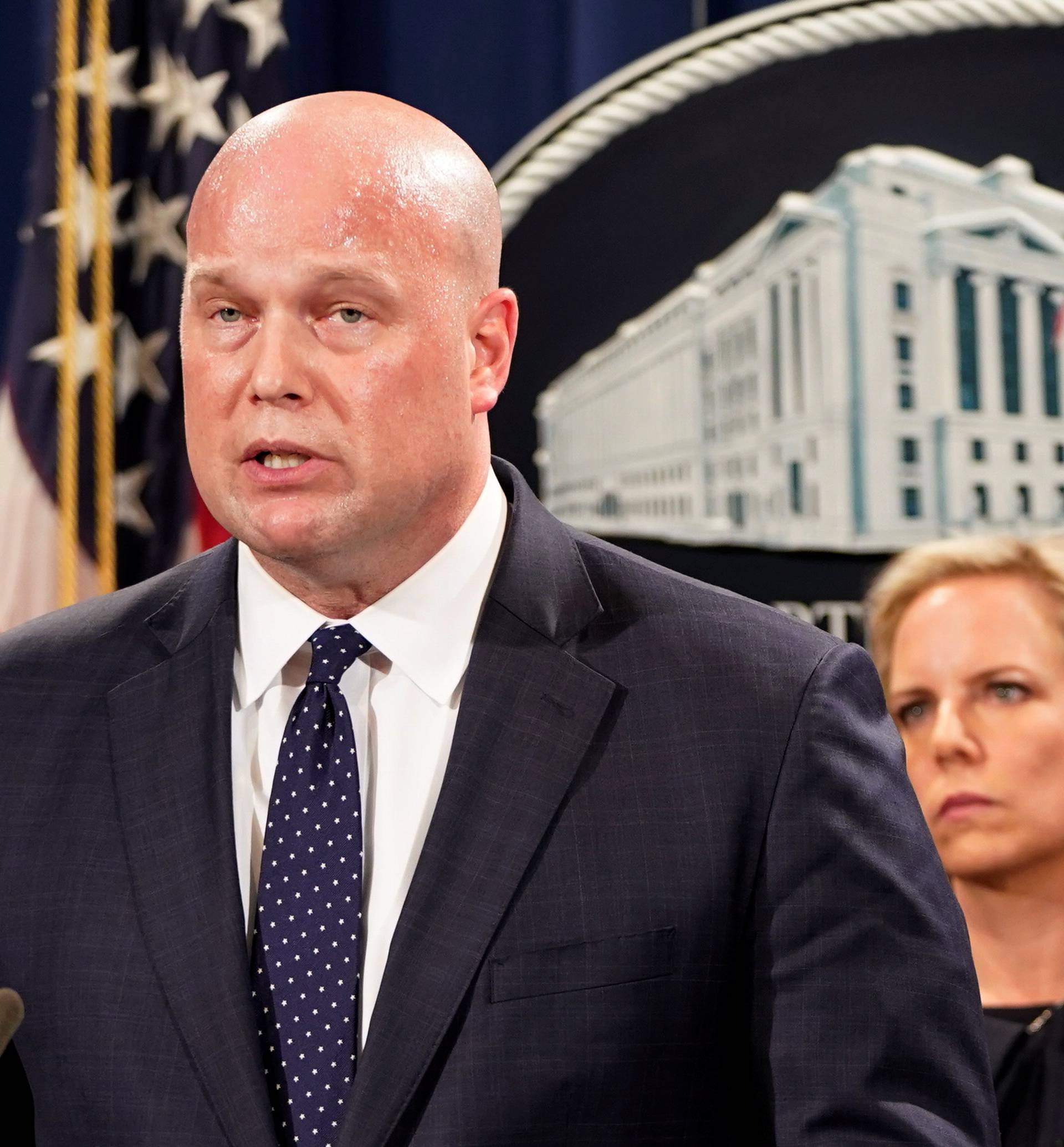 Acting Attorney General Matthew Whitaker and officials hold news conference to announce indictments against China's Huawei Technologies in Washington