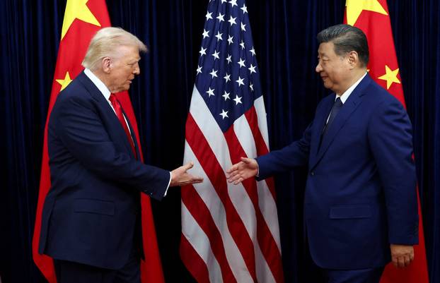 U.S. President Donald Trump meets with Chinese President Xi Jinping on the sidelines of the APEC summit, in Busan
