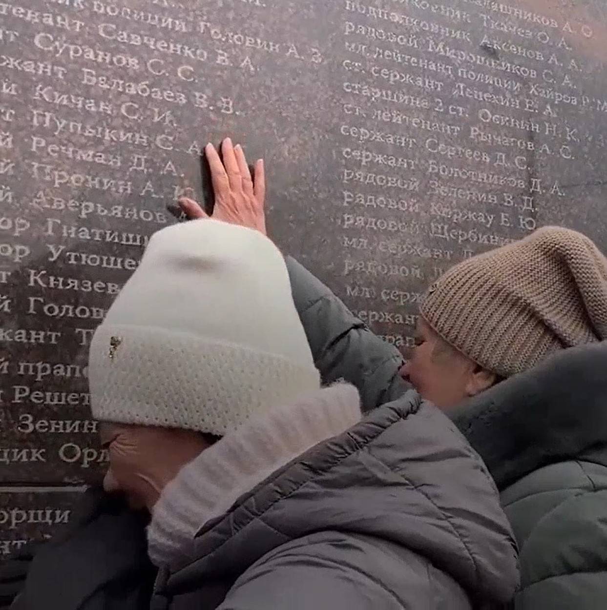 Agony etched on the faces of grief-stricken relatives at a new Saratov memorial to Russian troops slain in Putin's war in Ukraine.