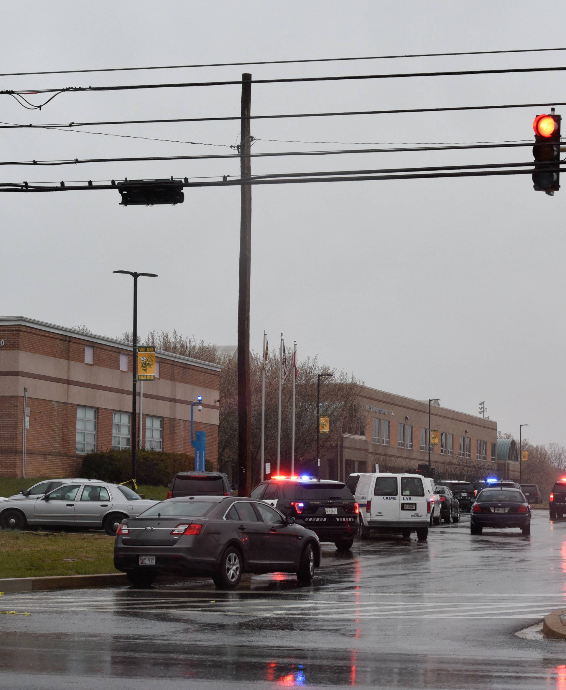 Emergency services and law enforcement vehicles are seen outside the Great Mills High School following a shooting on Tuesday morning in St. Mary's County, Maryland