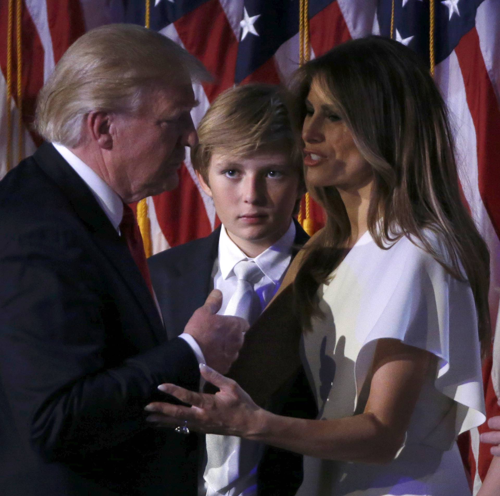 Republican U.S. president-elect Donald Trump speaks with family at his election night rally in Manhattan, New York