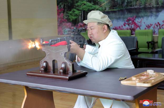 North Korean leader Kim Jong Un gives field guidance at a major weapon factory