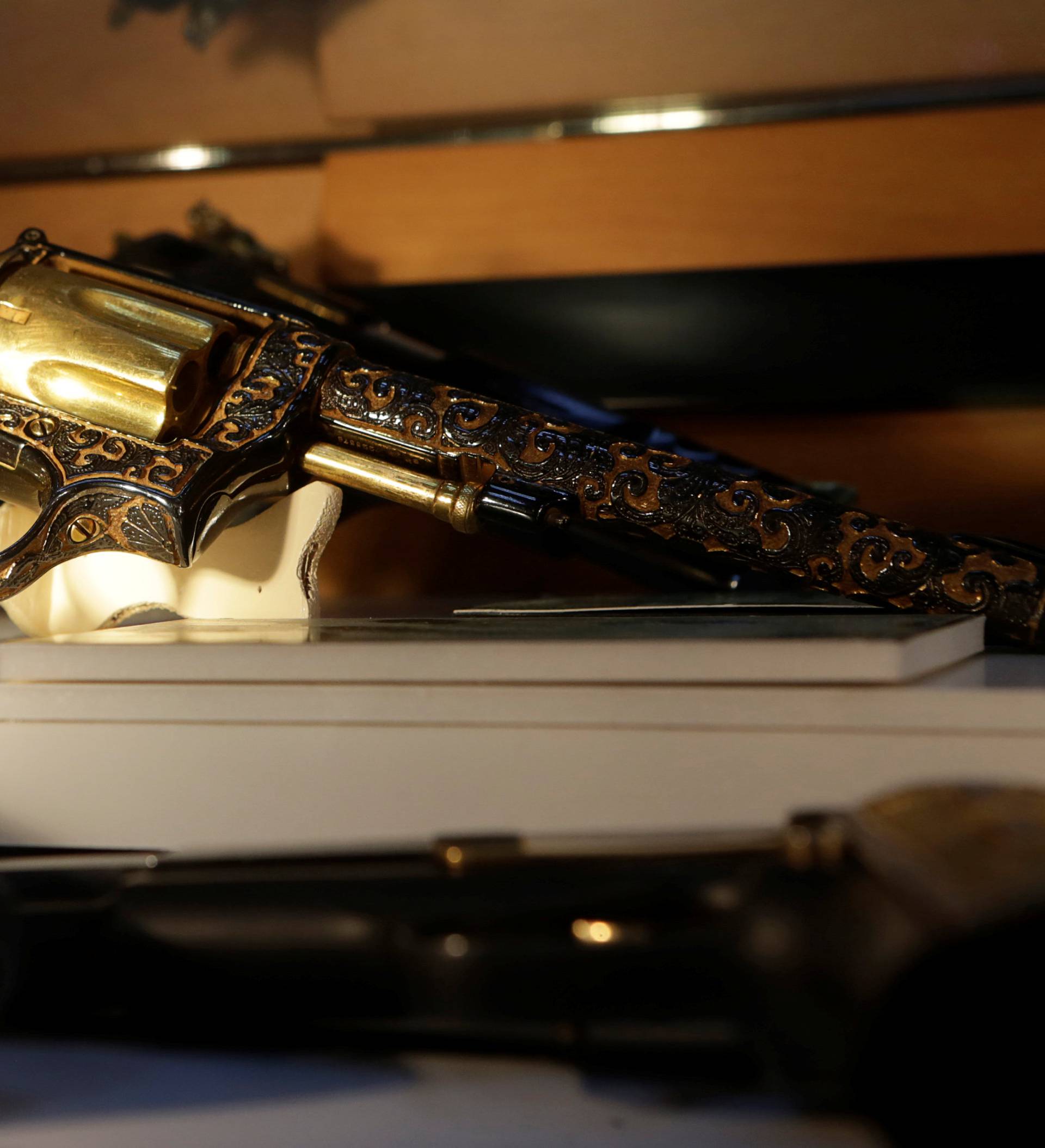 Guns decorated with gold are displayed in the Drugs Museum, used by the military to showcase to soldiers the lifestyles of Mexican drug lords, at the headquarters of the Ministry of Defense in Mexico Cit