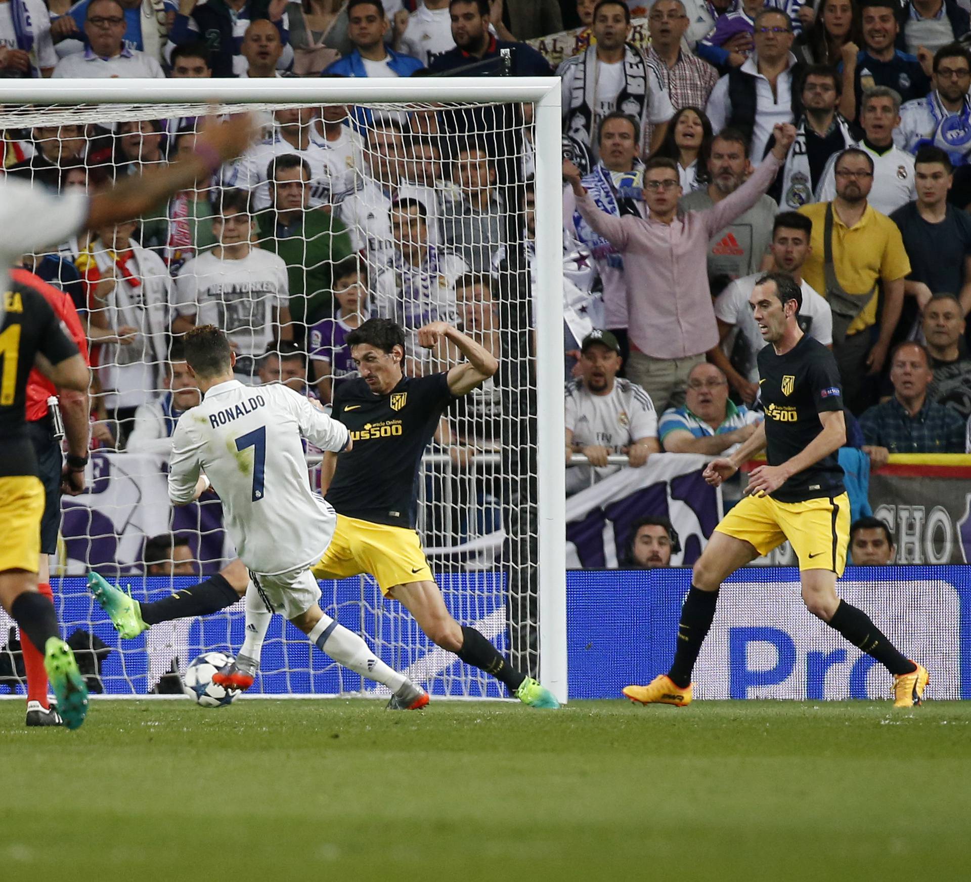 Real Madrid's Cristiano Ronaldo scores their third goal