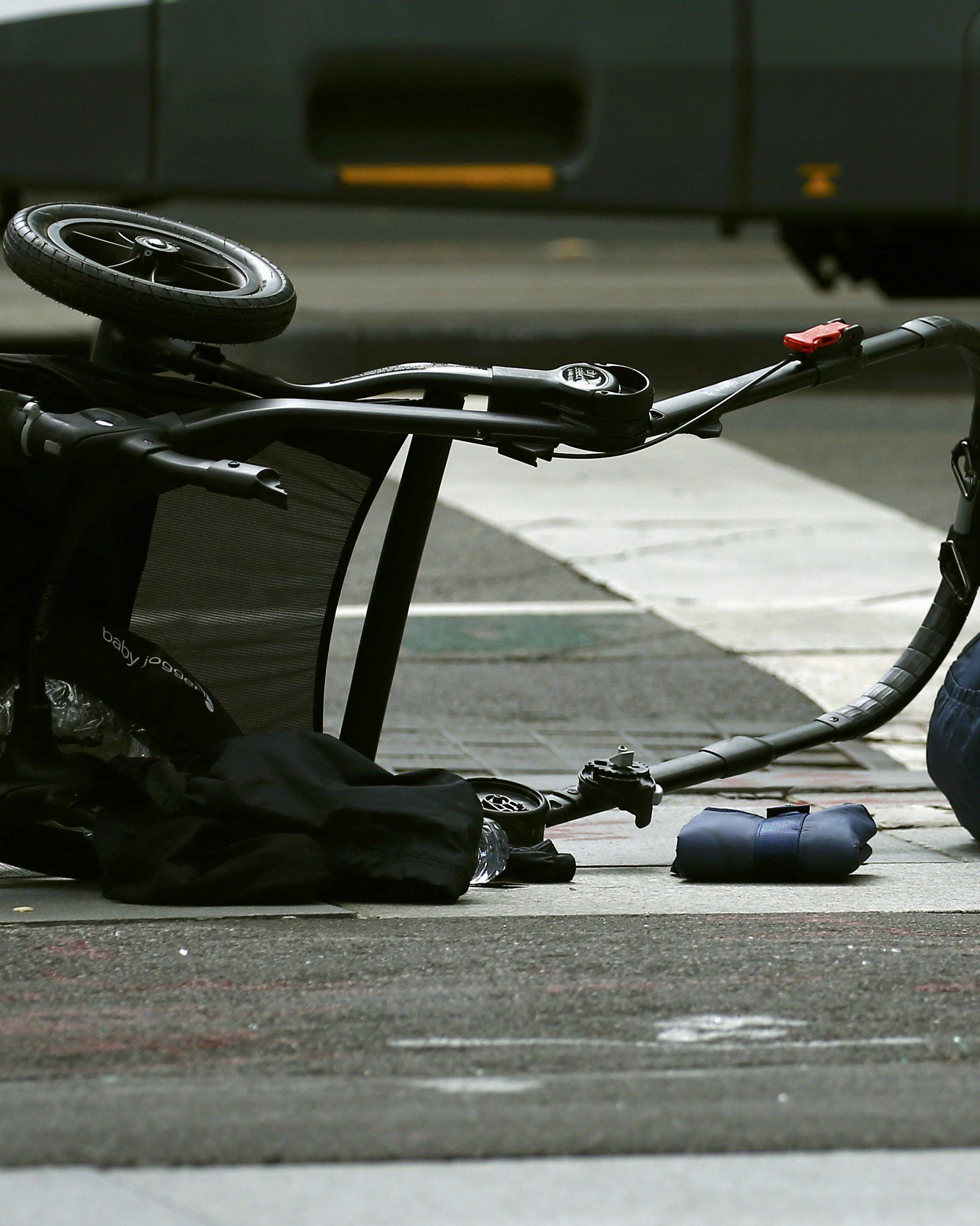 A pram is seen as police cordon off Bourke Street mall, after a car hit pedestrians in central Melbourne