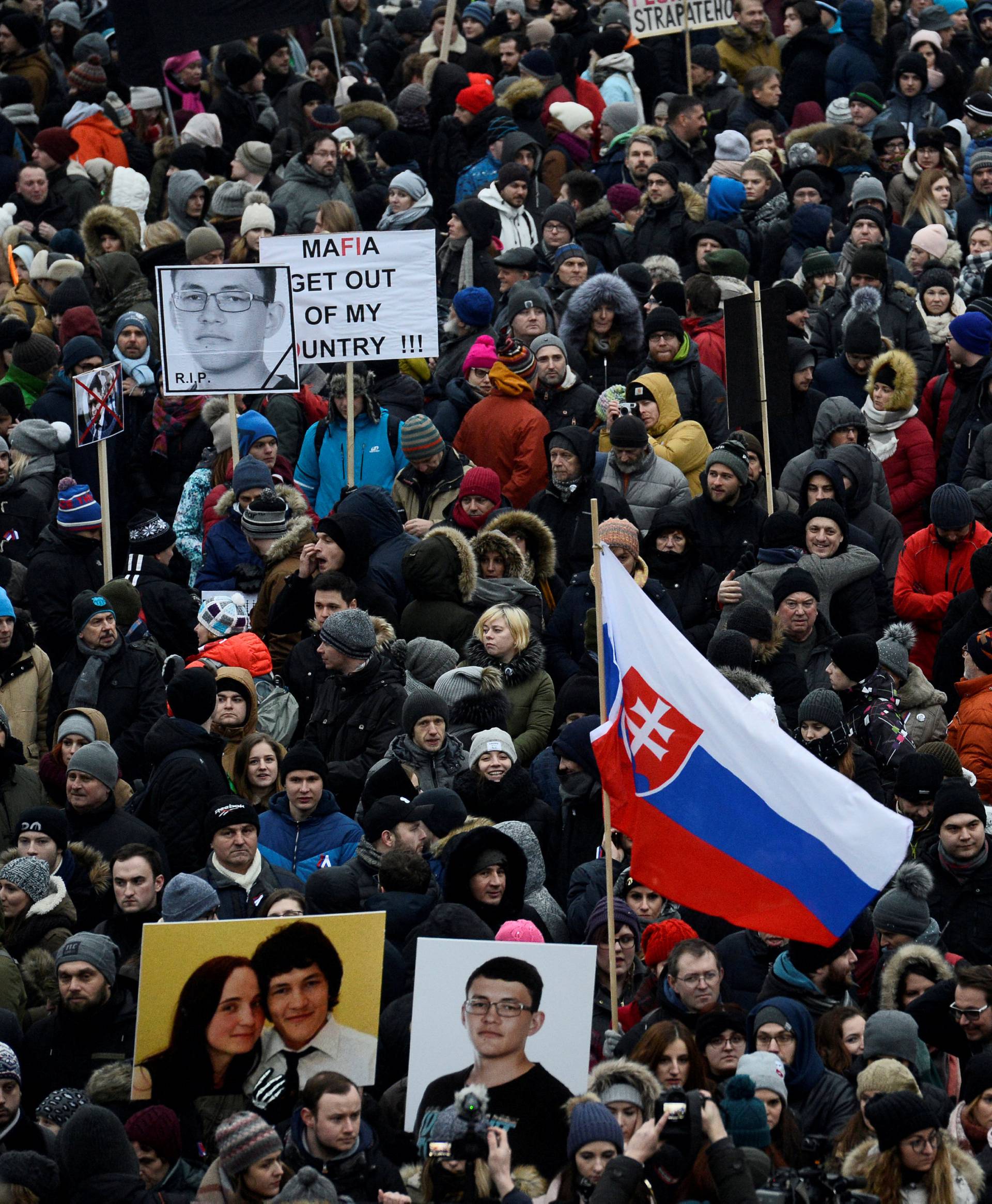 Participants march in honour of murdered Slovak investigative reporter Jan Kuciak in Bratislava