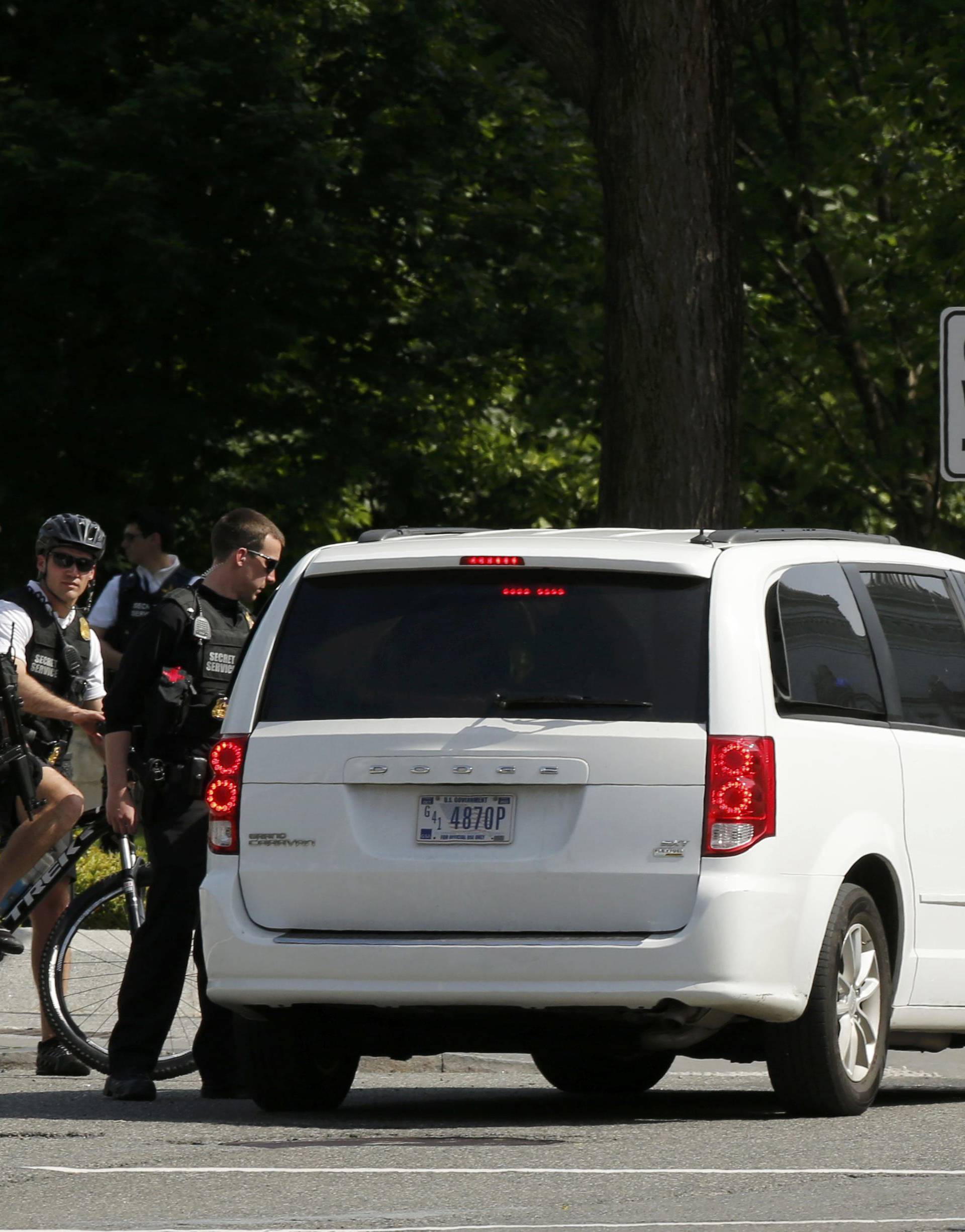 Secret Service agents stand guard after a shooting incident near the White House in Washington DC