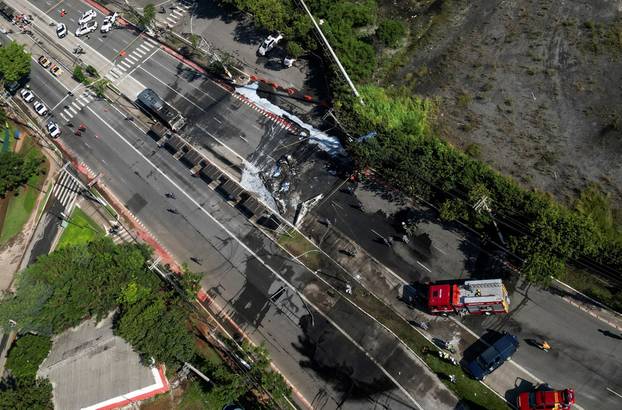 Small plane crashes into vehicles on busy Sao Paulo avenue