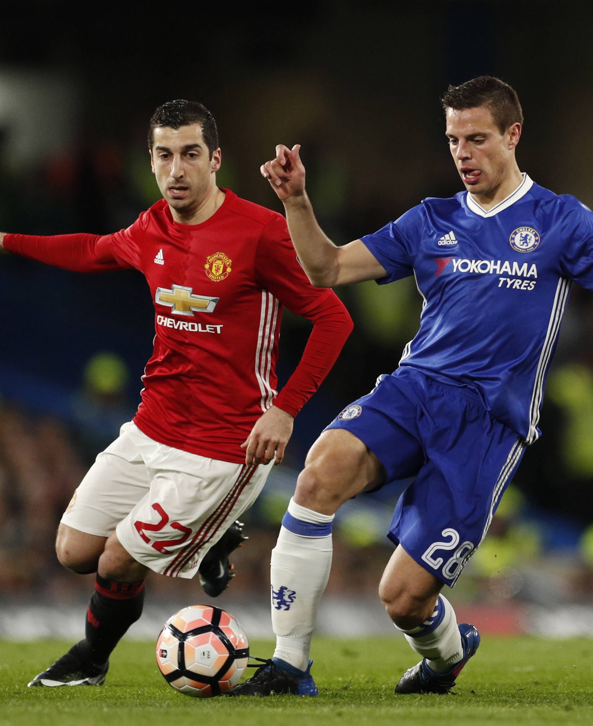 Chelsea's Cesar Azpilicueta in action with Manchester United's Henrikh Mkhitaryan