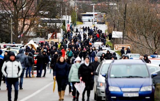 Kosovo Serbs block the road near the village of Rudine