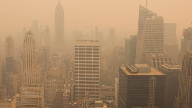 A view from the top of the Rockefeller Center, as haze and smoke caused by wildfires in Canada hang over the Manhattan skyline