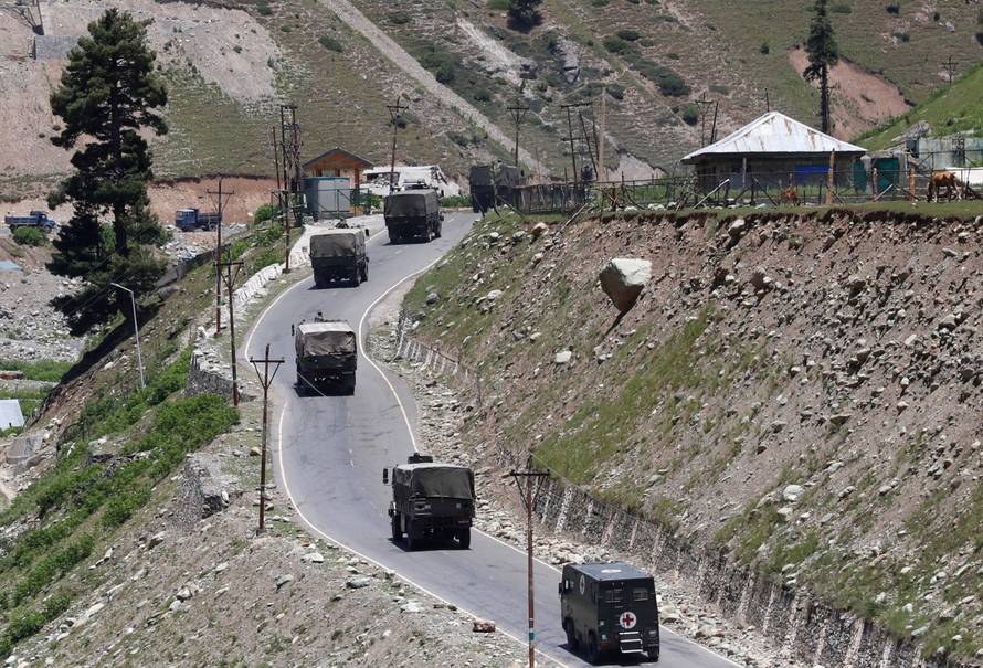 Indian army convoy moves along Srinagar-Leh national highway, at Gagangeer, in east Kashmir's Ganderbal district