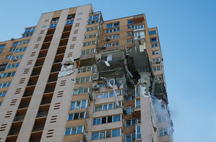 A view shows an apartment building damaged by recent shelling in Kyiv