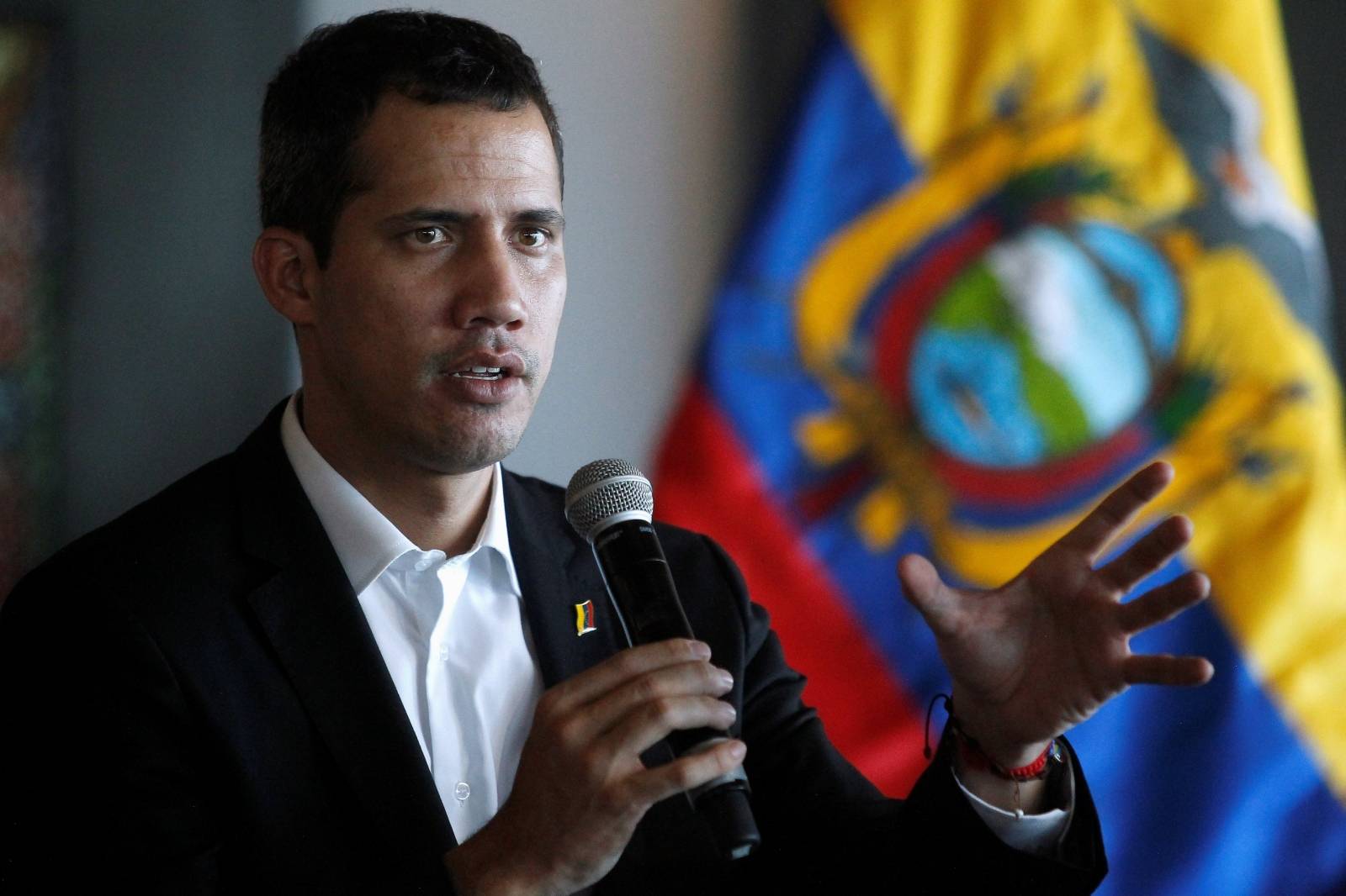 Venezuelan opposition leader Juan Guaido, who many nations have recognized as the country's rightful interim ruler, speaks during a meeting with Ecuador's President Lenin Moreno (not pictured) in Salinas