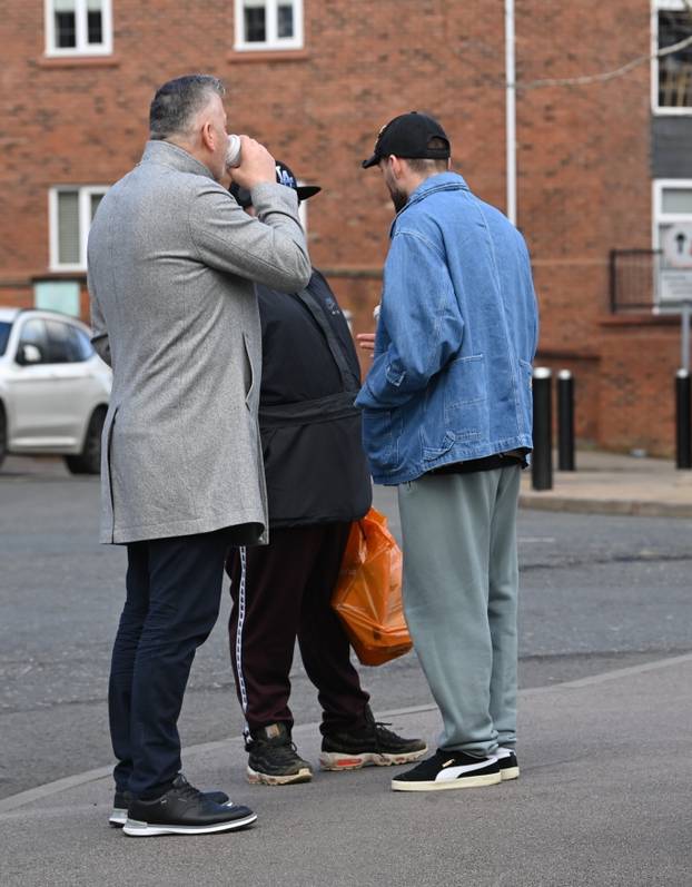 *EXCLUSIVE* WEB MUST CALL FOR PRICING - Manchester City's hard man, the Croatian footballer Mateo Kovacic with his wife Izabel and his father Stipo are stopped in their tracks by a somewhat irate fan in Wilmslow, Cheshire.