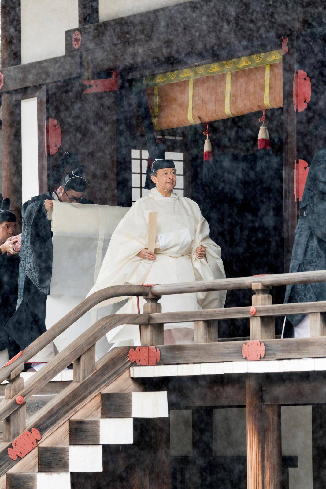 This handout photo taken and released by the Imperial Household Agency of Japan on October 22, 2019 shows Japan's Emperor Naruhito leaving Kashikodokoro sanctuary