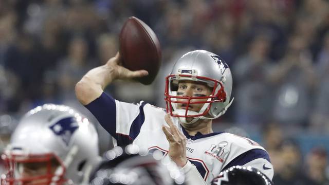 New England Patriots' quarterback Tom Brady throws a pass against the Atlanta Falcons during Super Bowl LI in Houston