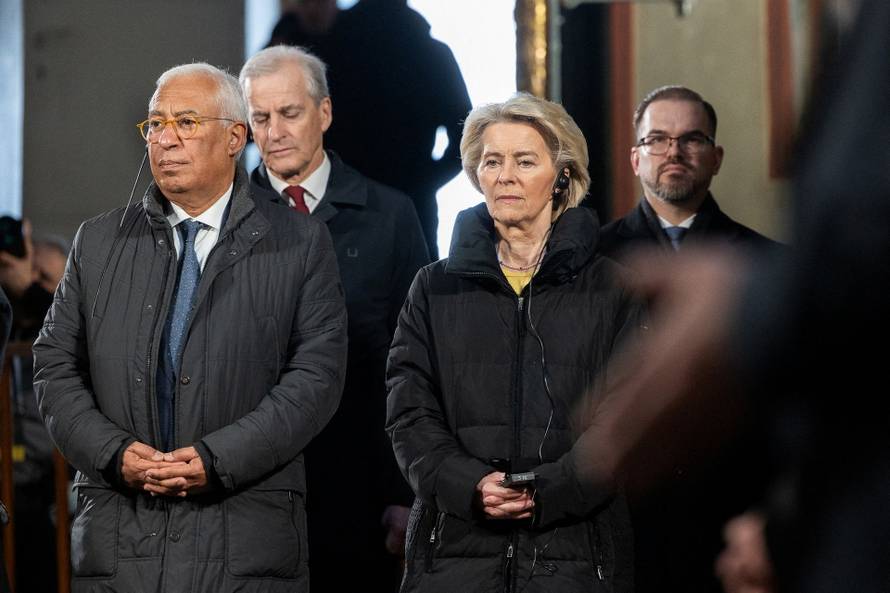 Prayer for peace inside the St. Sophia's Cathedral on the fourth anniversary of Russia's full-scale invasion, in Kyiv
