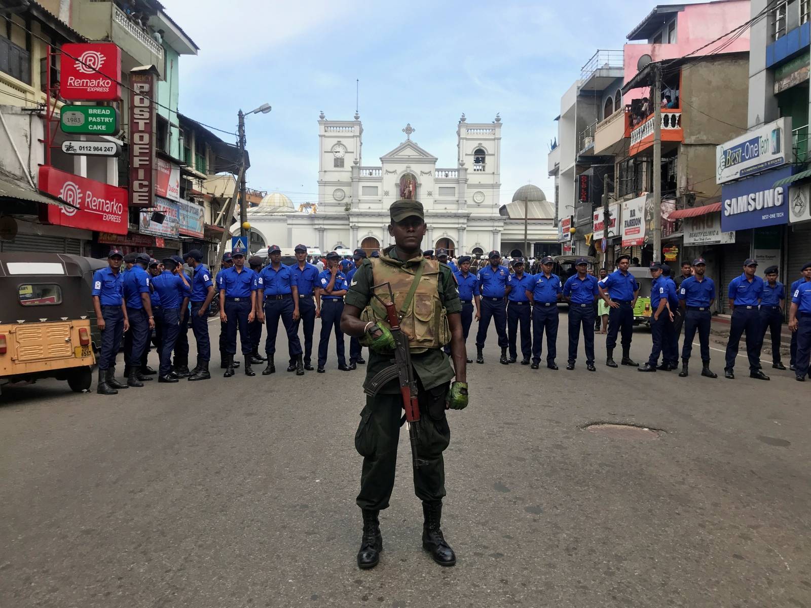 Sri Lankan military officials stand guard in front of the St. Anthony's Shrine, Kochchikade church after an explosion in Colombo