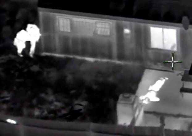 Stephon Clark is visible on the ground after two police officers shot him, in this still image captured from police aerial video by Sacramento Police Department