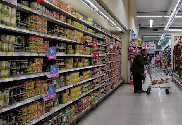 A man shops at a supermarket in Buenos Aires