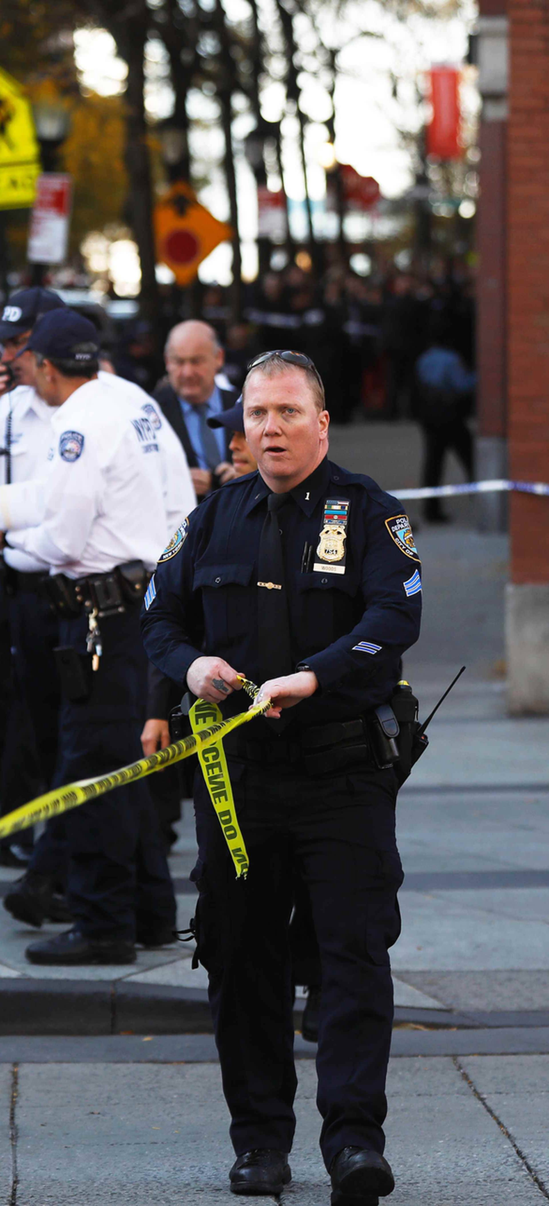 Police block off the street after a shooting incident in New York City