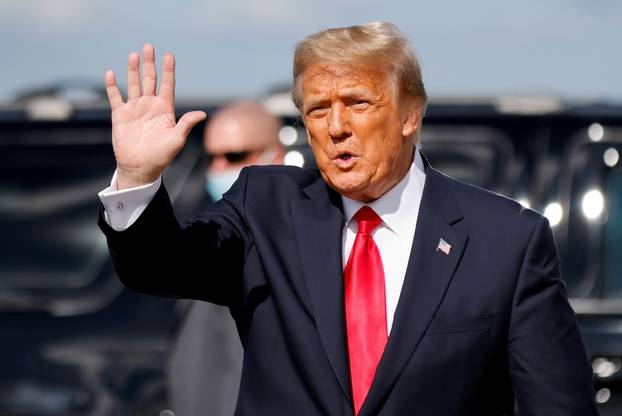 FILE PHOTO: U.S. President Donald Trump arrives at Palm Beach International Airport