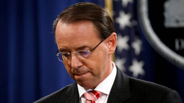 FILE PHOTO: Deputy U.S. Attorney General Rosenstein holds news conference to announce indictments in special counsel Robert Mueller's Russia investigation at the Justice Department in Washington