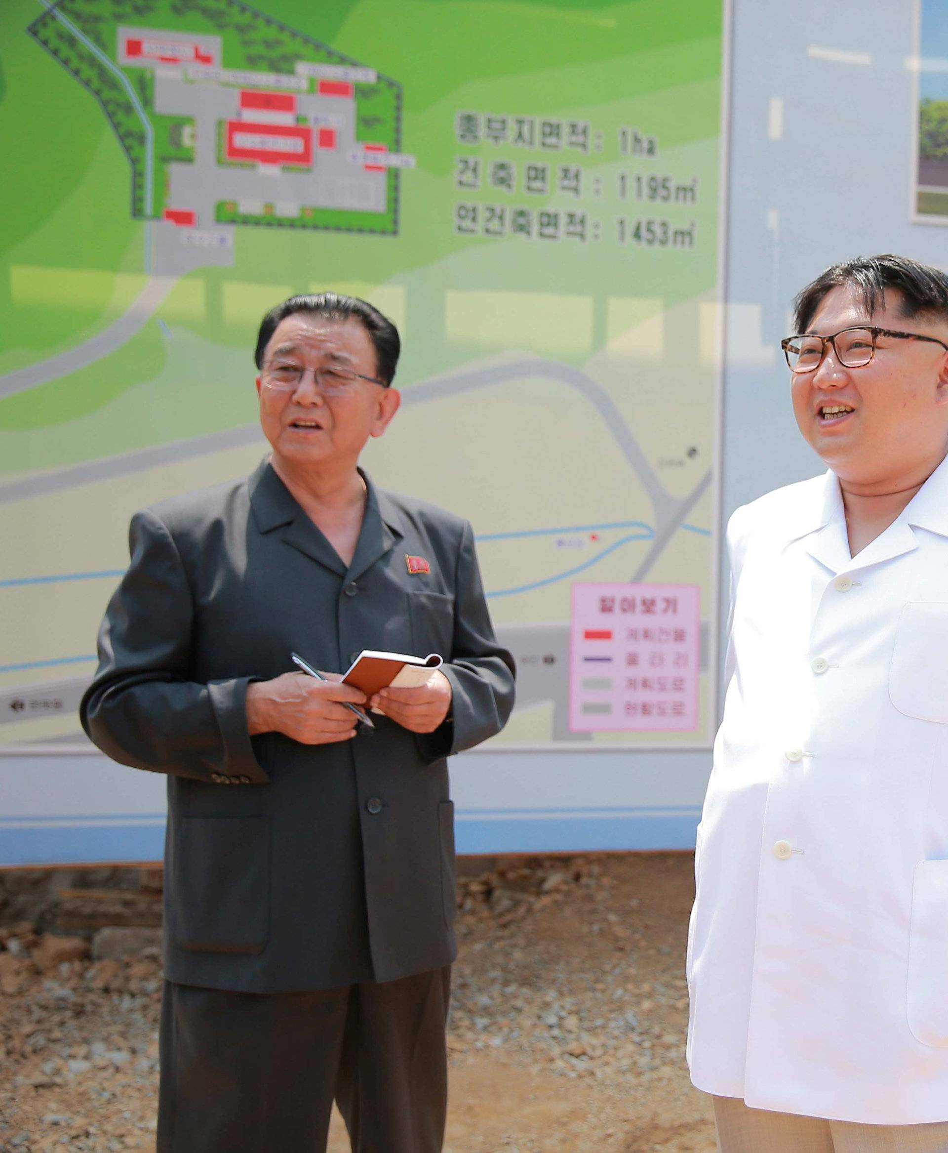 North Korean leader Kim Jong Un gives field guidance to the construction site of a medical oxygen factory in this undated photo released by North Korea's Korean Central News Agency