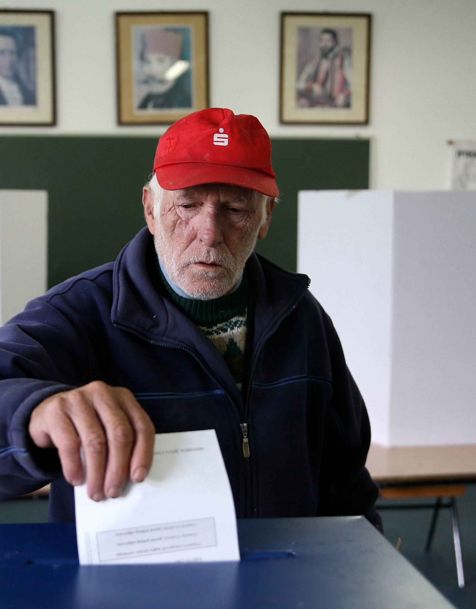 A man votes during a referendum on "Statehood Day" in Laktasi 