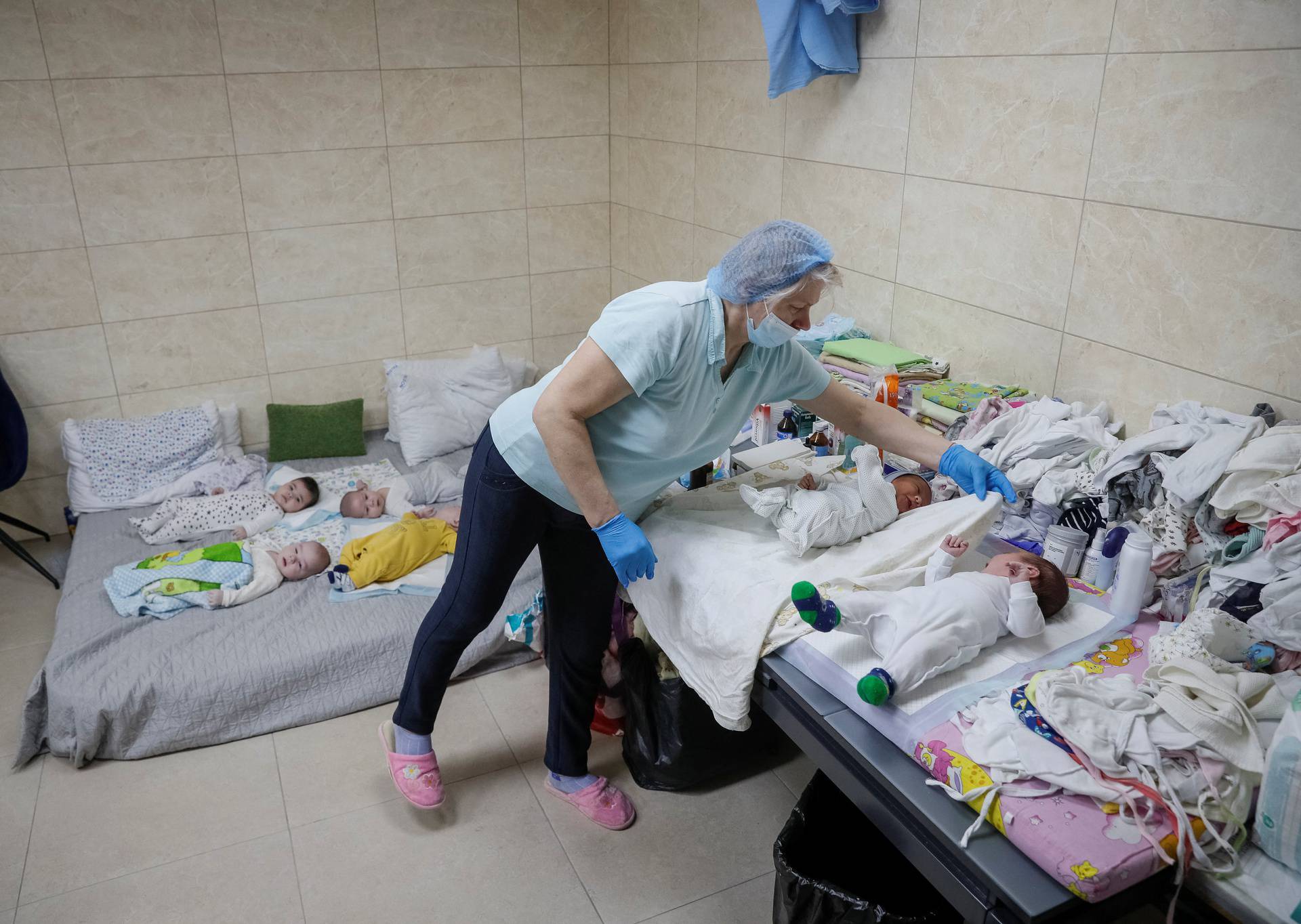 Babies born to surrogate mothers stranded in shelter amid Russia's invasion of Ukraine, in Kyiv