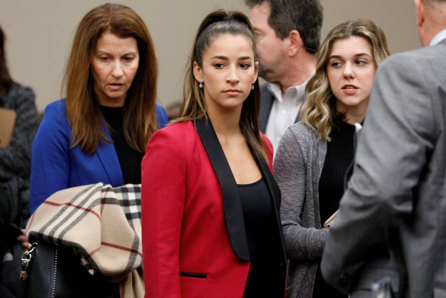 Victim and Olympic gold medalist Aly Raisman appears before speaking at the sentencing hearing for Larry Nassar, a former team USA Gymnastics doctor who pleaded guilty in November 2017 to sexual assault charges, in Lansing